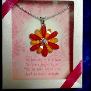 Cute necklace with quote "the beauty of a flower"